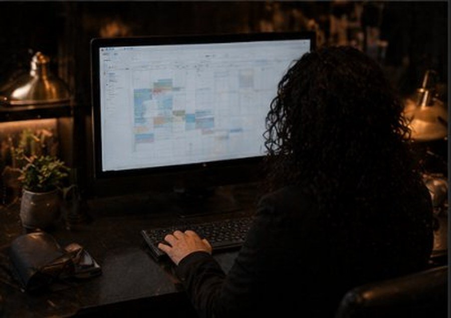 Executive Assistant reviewing an executive calendar and preparing the day around meetings, priorities, and follow-ups.